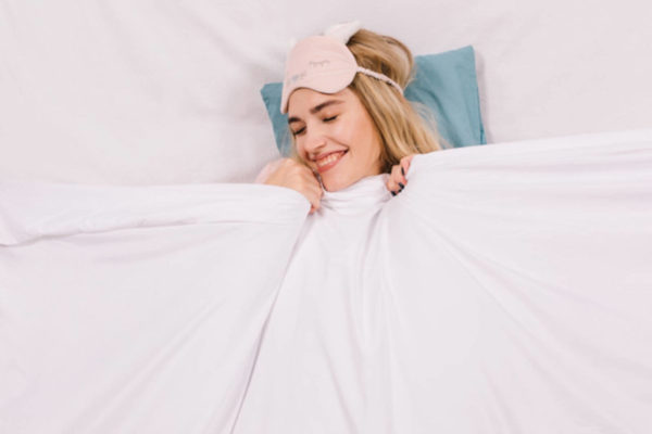 Coco Ruby Plastic Surgery How Sleep Better Abdominoplasty Image- Woman Sleeping Smiling